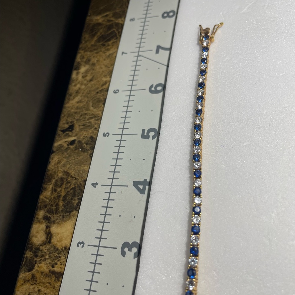 Elegant Goldtone and Blue Tennis Bracelet